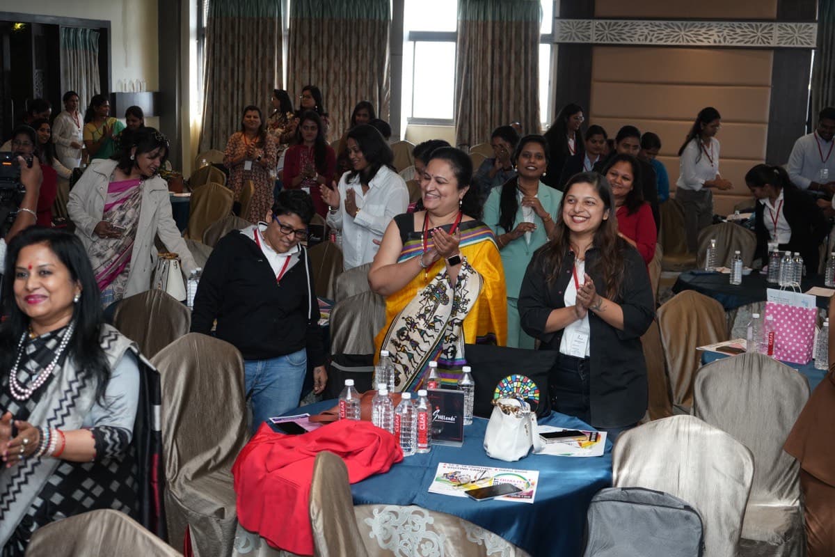 Women entrepreneurs from the SHELeadsIndia community laughing together at a meetup